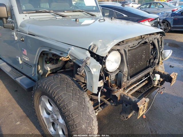 44338904 :رقم المزاد ، 1C4BJWEG0EL104797 vin ، 2014 Jeep Wrangler Unlimited Sahara مزاد بيع