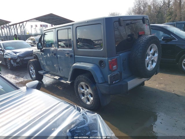 44338904 :رقم المزاد ، 1C4BJWEG0EL104797 vin ، 2014 Jeep Wrangler Unlimited Sahara مزاد بيع