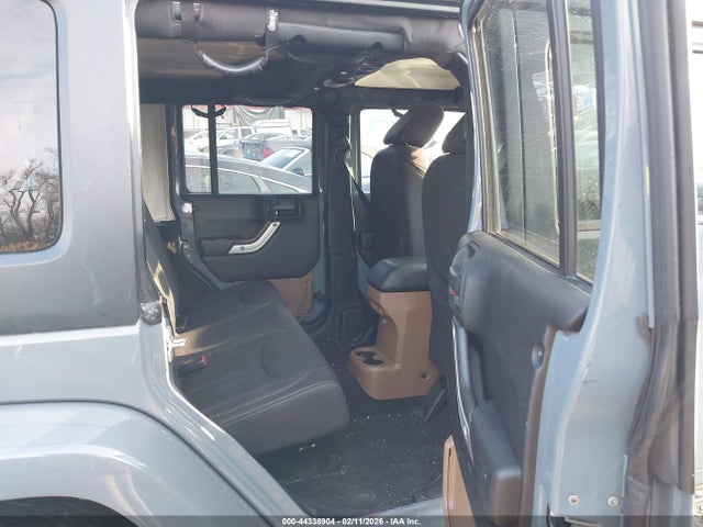 44338904 :رقم المزاد ، 1C4BJWEG0EL104797 vin ، 2014 Jeep Wrangler Unlimited Sahara مزاد بيع