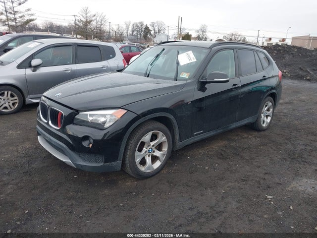 2013 BMW X1 WBAVM1C55DVW43635 Photo 1