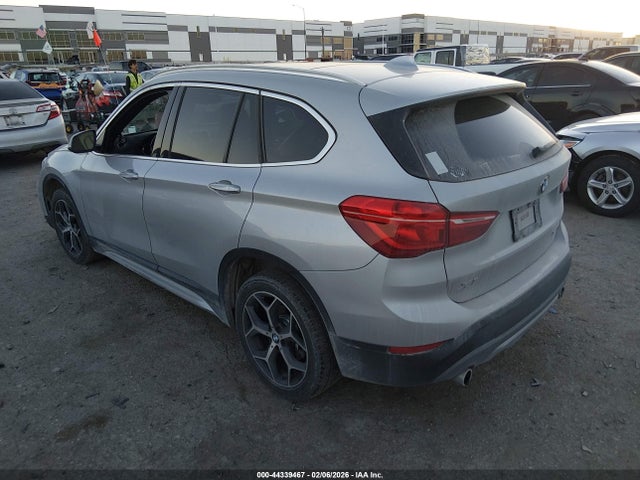 2018 BMW X1 WBXHT3C34J5L34105 Photo 2