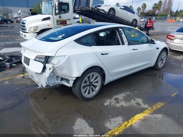 Продажа на аукционе авто 2021 Tesla Model 3 Standard Range Plus Rear-wheel Drive, vin: 5YJ3E1EAXMF057030, номер лота: 44342323