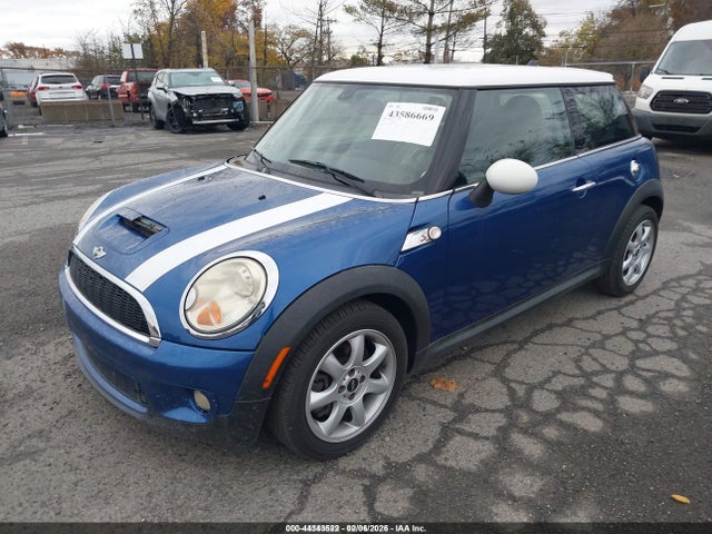 2009 MINI COOPER S WMWMF73589TT94677 Photo 1