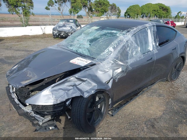 2026 TESLA MODEL Y 7SAYGDED2TF422250 Photo 1