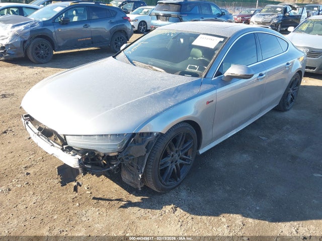 2016 AUDI A7 WAUWGAFC1GN010284 Photo 1