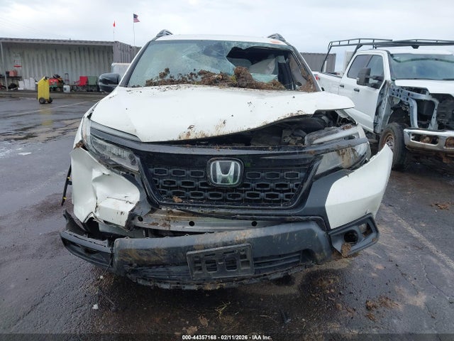 5FNYF8H9XKB017556 Honda Passport Touring