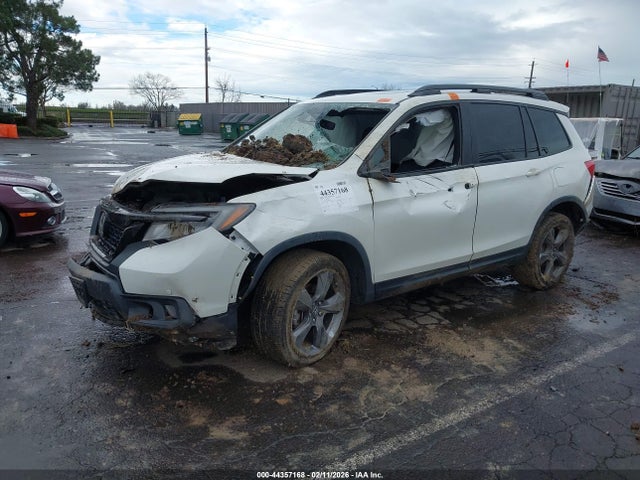 5FNYF8H9XKB017556 Honda Passport Touring