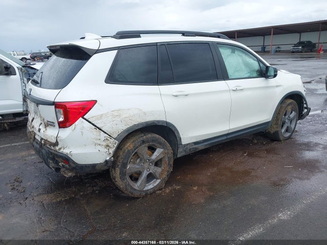 5FNYF8H9XKB017556 Honda Passport Touring