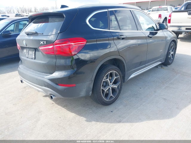 2016 BMW X1 WBXHT3C37GP881835 Photo 3