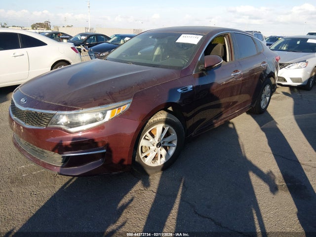 5XXGT4L33GG114733 KIA Optima Lx