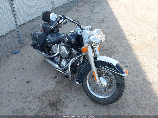 2011 HARLEY-DAVIDSON FLSTC 1HD1BW510BB042435