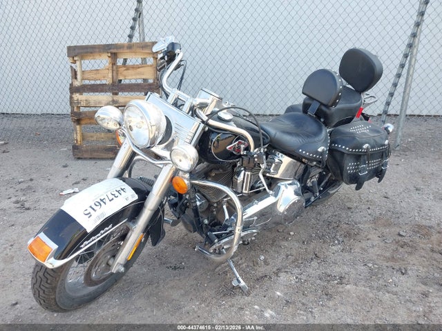 2011 HARLEY-DAVIDSON FLSTC 1HD1BW510BB042435 Photo 1