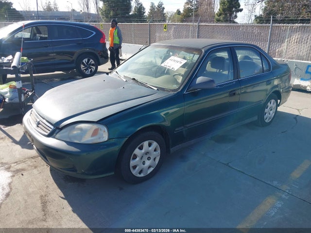 1999 HONDA CIVIC 2HGEJ6576XH563668 Photo 1