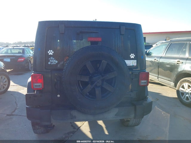 1C4BJWDG0EL108026 Jeep Wrangler Unlimited Sport