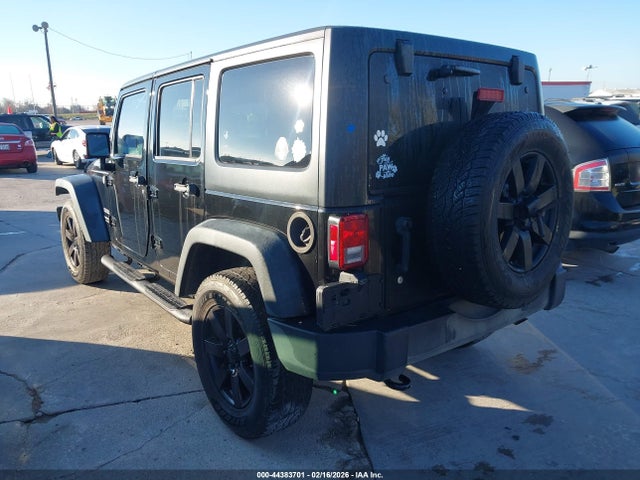 1C4BJWDG0EL108026 Jeep Wrangler Unlimited Sport