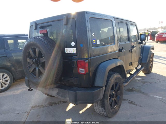 1C4BJWDG0EL108026 Jeep Wrangler Unlimited Sport