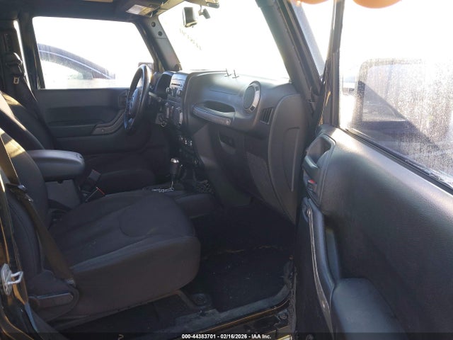 1C4BJWDG0EL108026 Jeep Wrangler Unlimited Sport