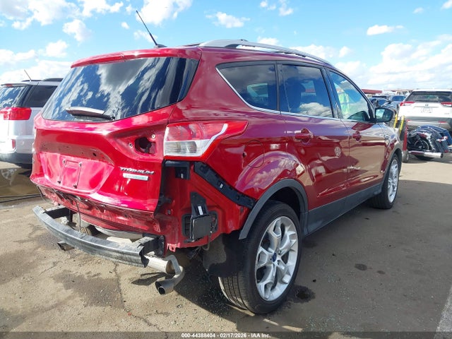 1FMCU0JX7EUA93818 Ford Escape Titanium