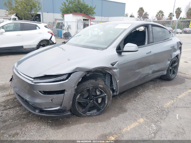2026 TESLA MODEL Y 7SAYGDED6TF538275 Photo 1