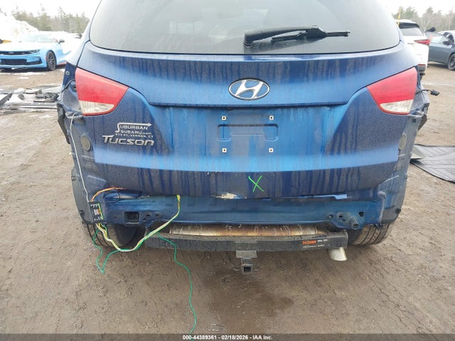KM8JU3AGXEU831930 Hyundai TUCSON SE