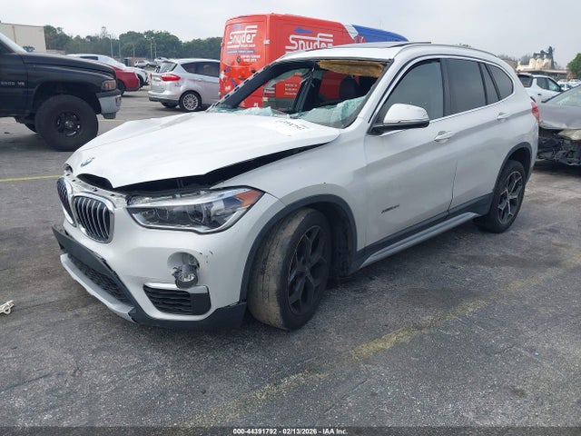 2016 BMW X1 WBXHT3C34GP883672 Photo 1