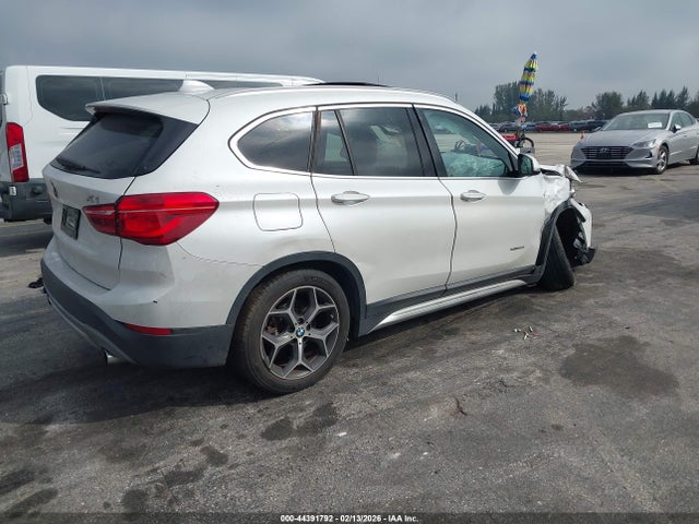 2016 BMW X1 WBXHT3C34GP883672 Photo 3