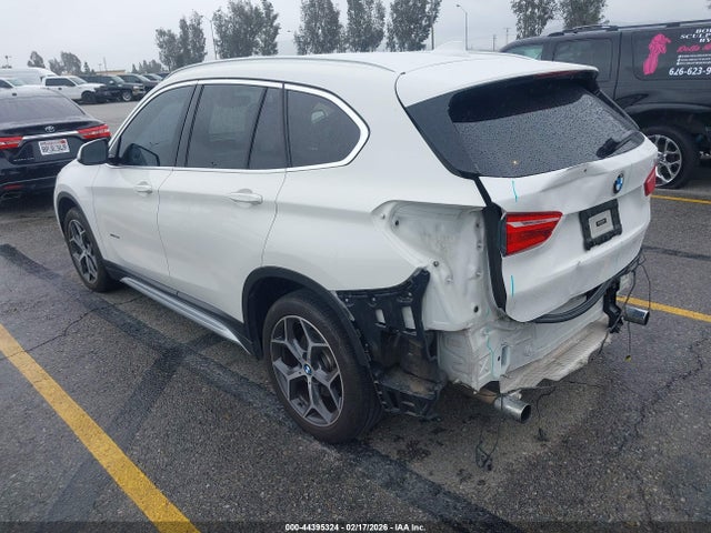 2017 BMW X1 WBXHU7C32H5H37274 Photo 2