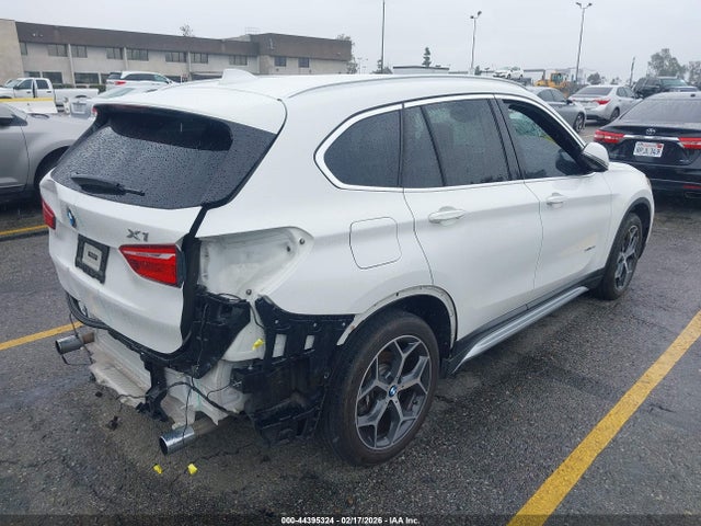 2017 BMW X1 WBXHU7C32H5H37274 Photo 3
