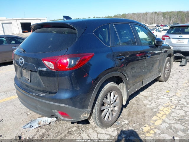 44400384 :رقم المزاد ، JM3KE2CYXE0396928 vin ، 2014 Mazda Cx-5 Touring مزاد بيع