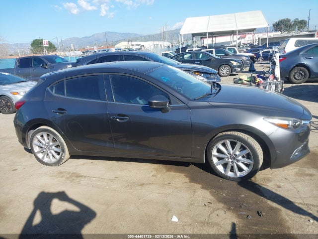 JM1BN1M35H1122198 Mazda 3