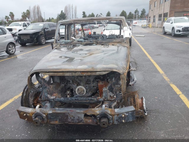 1C4HJWDG1EL297523 Jeep Wrangler Unlimited Sport