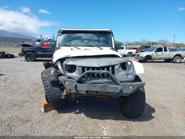 1C4HJWDGXGL177416 Jeep Wrangler Unlimited Sport