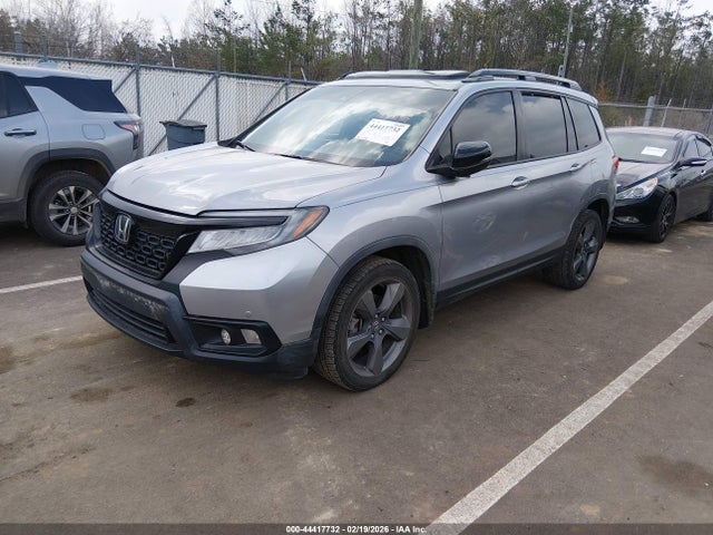 5FNYF7H95KB004174 Honda Passport Touring