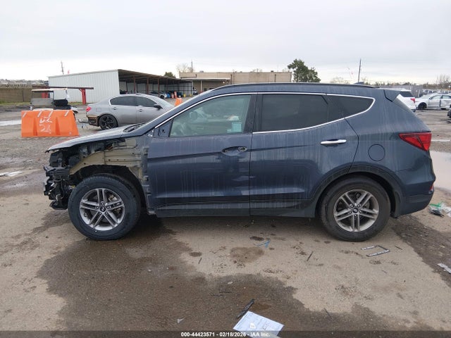 5NMZU3LB8HH021457 Hyundai Santa Fe Sport 2.4l