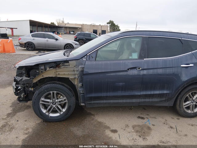 5NMZU3LB8HH021457 Hyundai Santa Fe Sport 2.4l