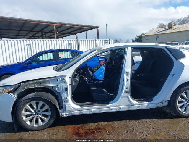 5XXGT4L34GG004564 KIA Optima Lx