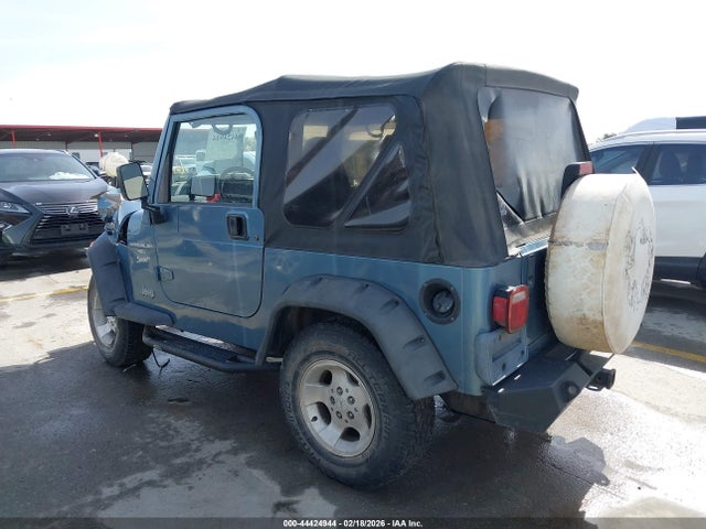 1999 JEEP WRANGLER 1J4FY19S8XP443604 Photo 2