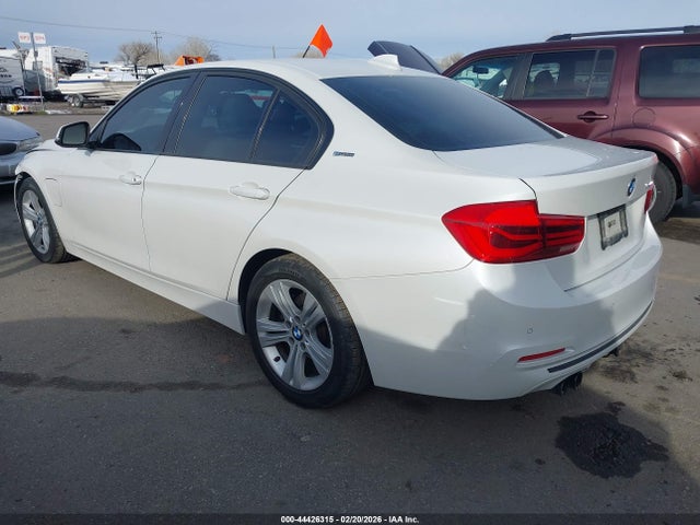 2016 BMW 330E WBA8E1C52GK479776 Photo 2