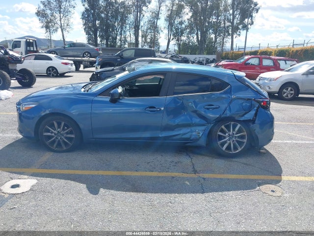 3MZBN1L36JM246469 Mazda Mazda3 Touring