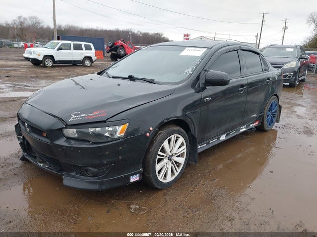 2009 MITSUBISHI LANCER JA3AU26U39U027017 Photo 1