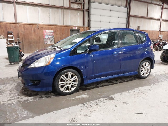 2009 HONDA FIT JHMGE884X9S016583 Photo 1