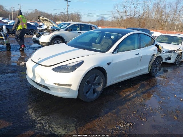 2023 TESLA MODEL 3 5YJ3E1EA5PF477718 Photo 1