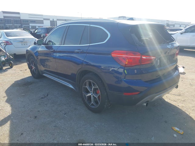 2017 BMW X1 WBXHT3C36H5F79243 Photo 2