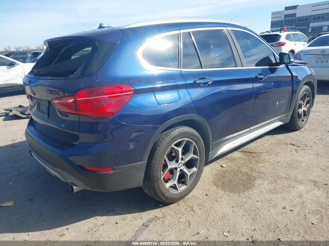 2017 BMW X1 WBXHT3C36H5F79243 Photo 3