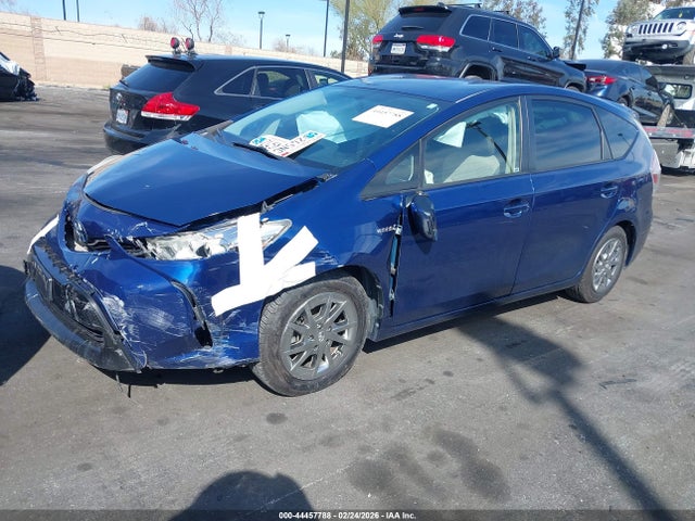 JTDZN3EUXFJ030082 Toyota Prius V Three