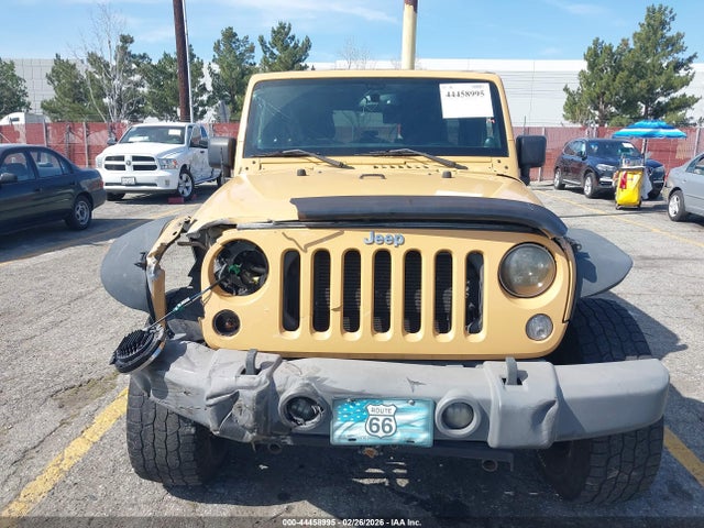 1C4BJWDG4EL148691 Jeep Wrangler Unlimited Sport