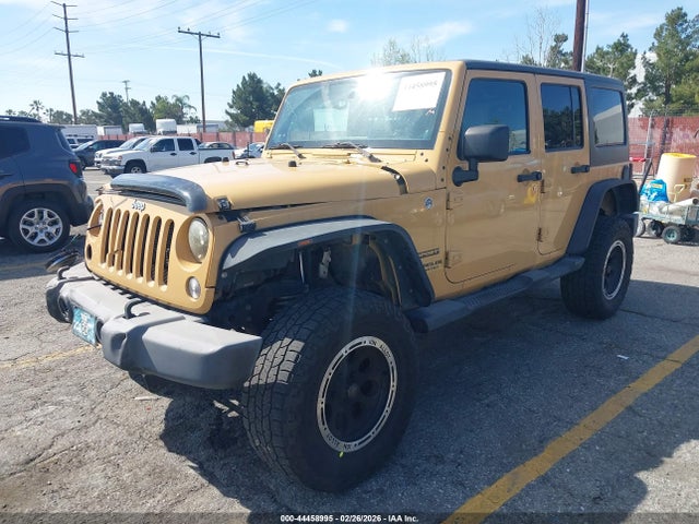 1C4BJWDG4EL148691 Jeep Wrangler Unlimited Sport