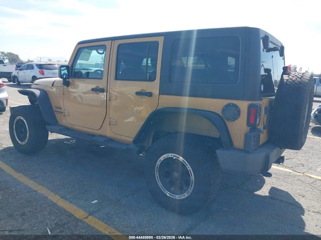 1C4BJWDG4EL148691 Jeep Wrangler Unlimited Sport