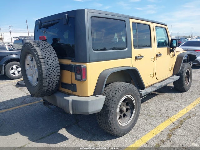 1C4BJWDG4EL148691 Jeep Wrangler Unlimited Sport