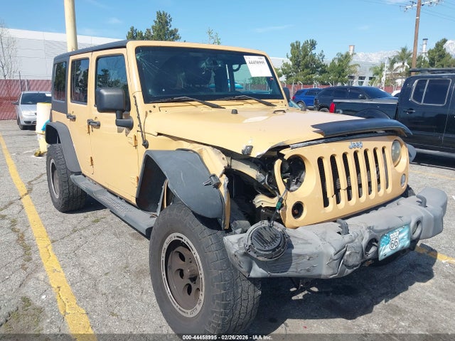 1C4BJWDG4EL148691 Jeep Wrangler Unlimited Sport